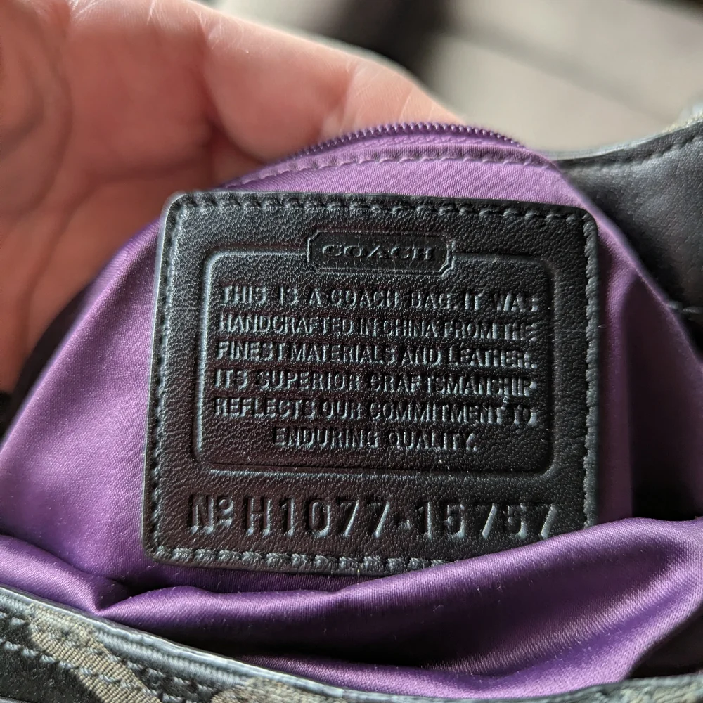 Coach Black Signature Circle Hobo Bag